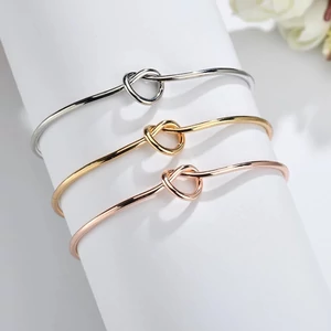 Kép 3/4 - Divatos drót karkötő csomóval "arany"_2