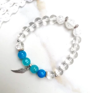 Kép 2/2 - Hegyikristály ásványkarkötő védelmező angyalszárny medállal