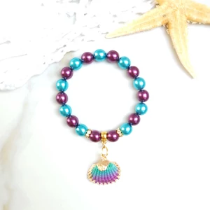 Kép 3/3 - Türkiz - Lila kagyló medálos karkötő