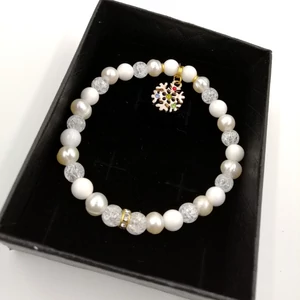 Kép 2/2 - Arany hópihe medálos ásványkarkötő