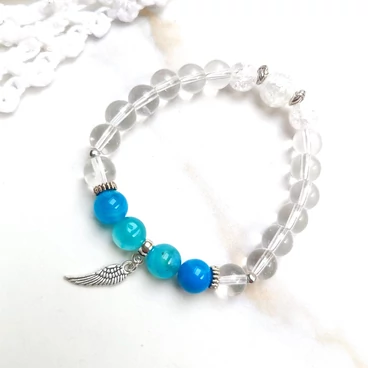 Hegyikristály ásványkarkötő védelmező angyalszárny medállal