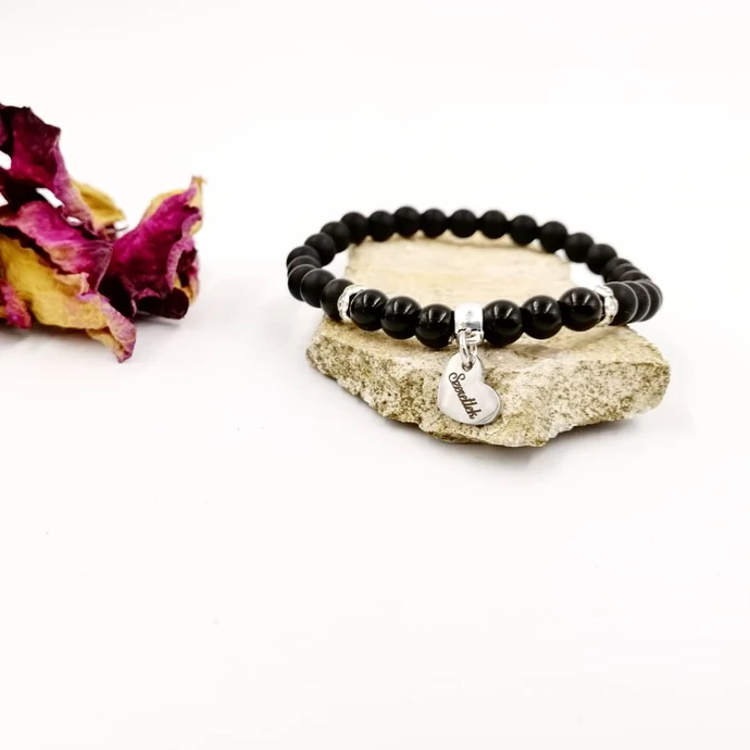 Lótusz medálos ónix karkötő