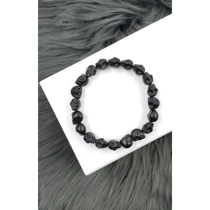 Koponya medálokkal díszített csiszol lávakő ásványkarkötő