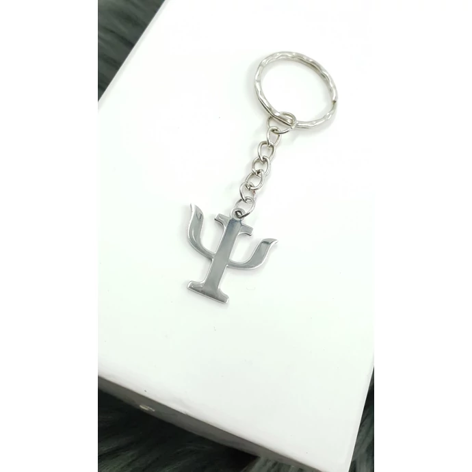 Pszichológia szimbólumával díszített kulcstartó