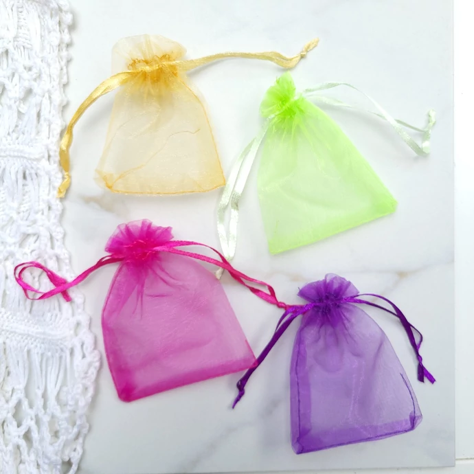 Tüll tasak (több szíben) színes díszcsomagolás ékszer csomagolás ajándék ajándékozás